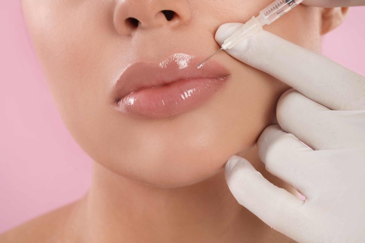 Close Look Of Woman Taking Lip Filler | Beauty Nurse Bre in Reading & Boston, MA